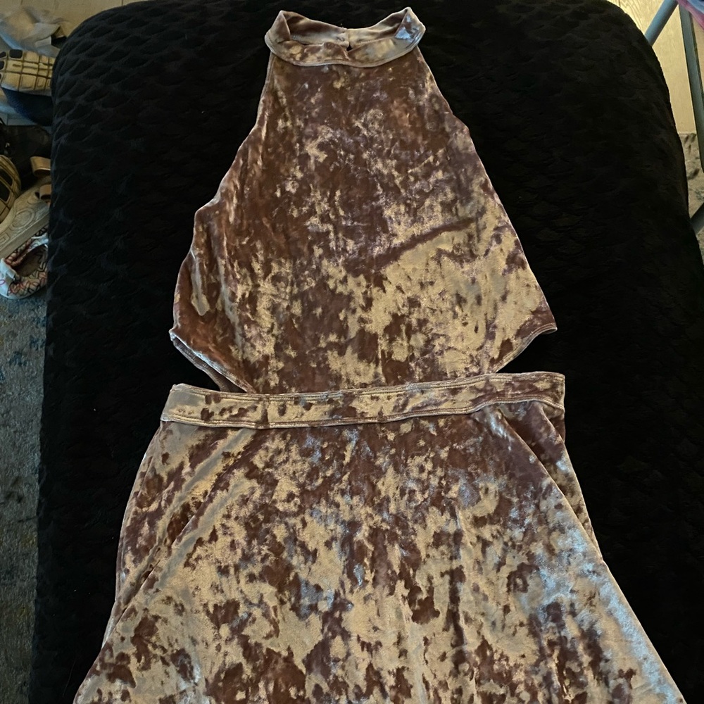 Velvet tan dress that goes right above the knees, with cut outs on the sides